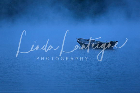 row boat in fog on Lake Fairlee, VT