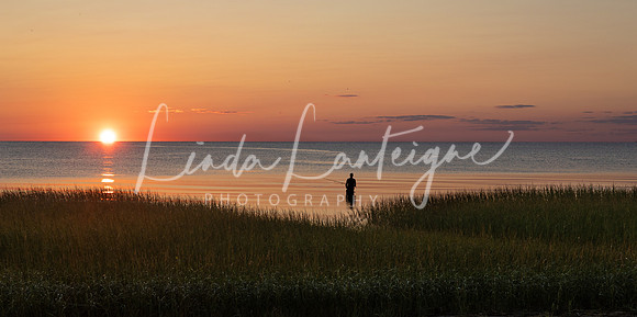 Final cast at sunset off First Encounter Beach, Cape Cod